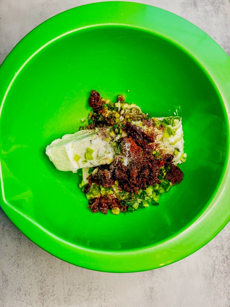 Filling ingredients for stuffed chicken breasts before being mixed