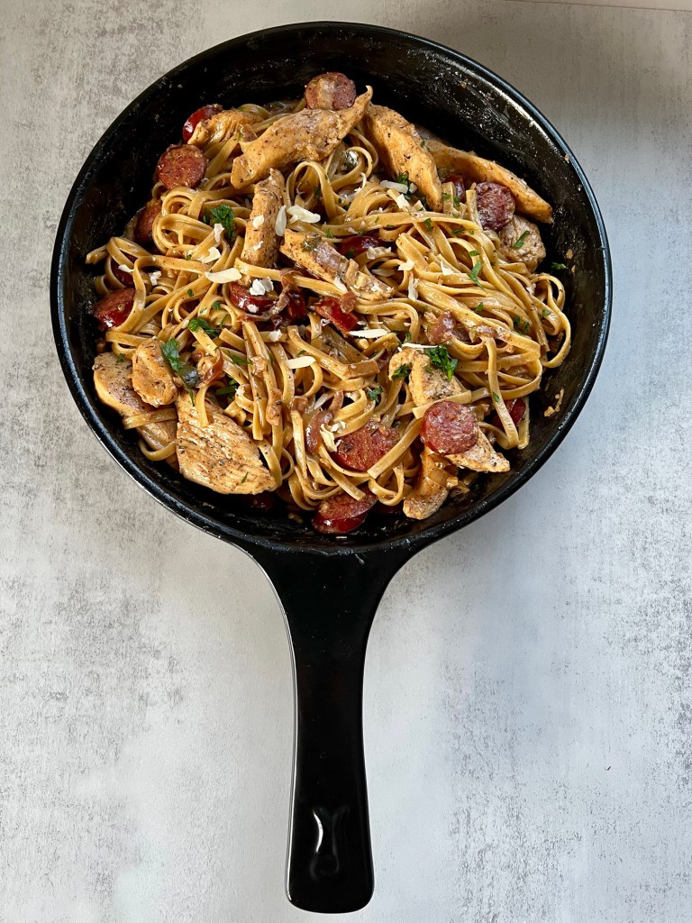 Sausage Chicken Cajun Pasta in an Xtrema pan on a countertop