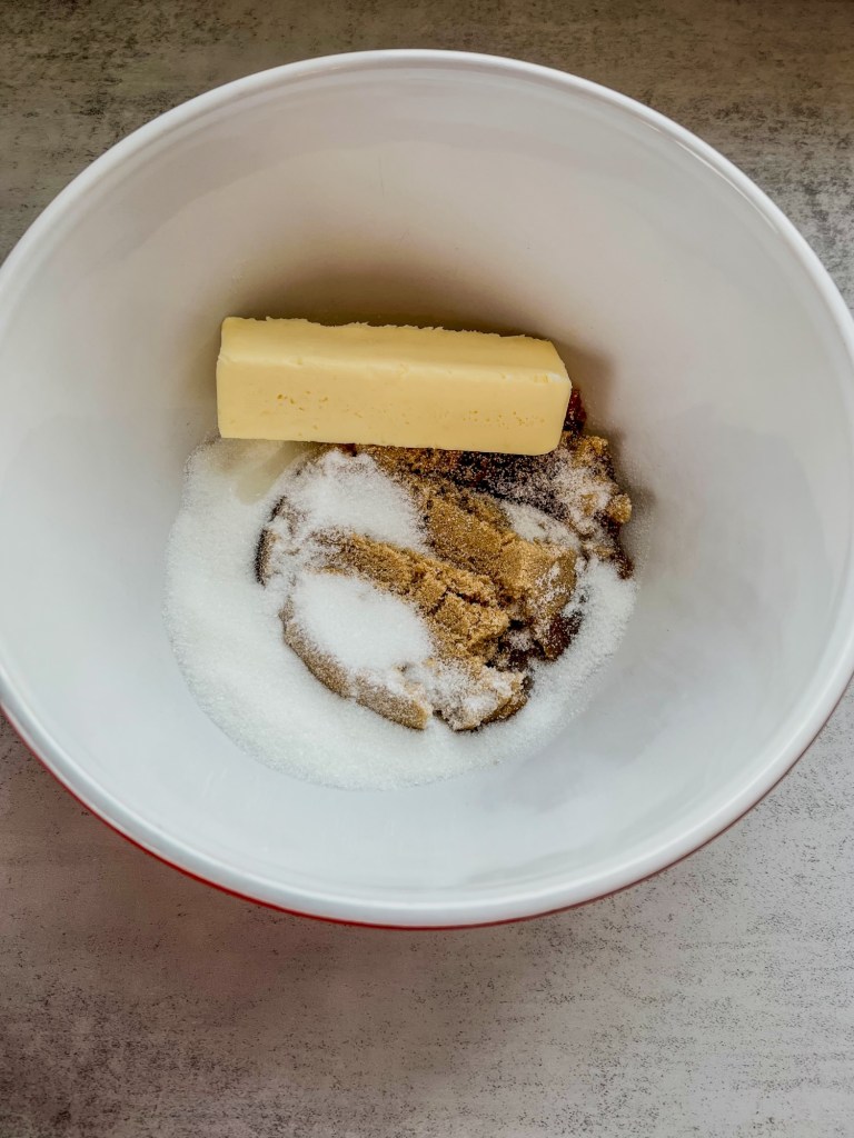 Butter, sugar, and coconut oil in a mixing bowl