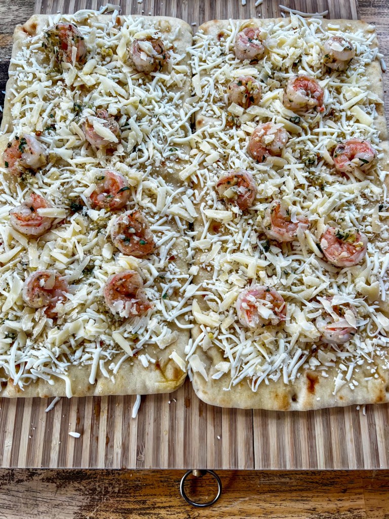 Shrimp scampi flatbreads just before going into the oven