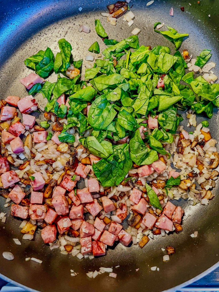 Filling for everything omelet in a skillet on the stove