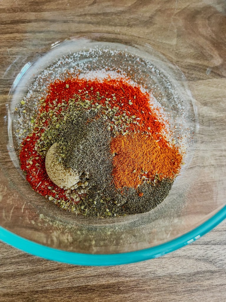 A bowl full of spices for rib rub