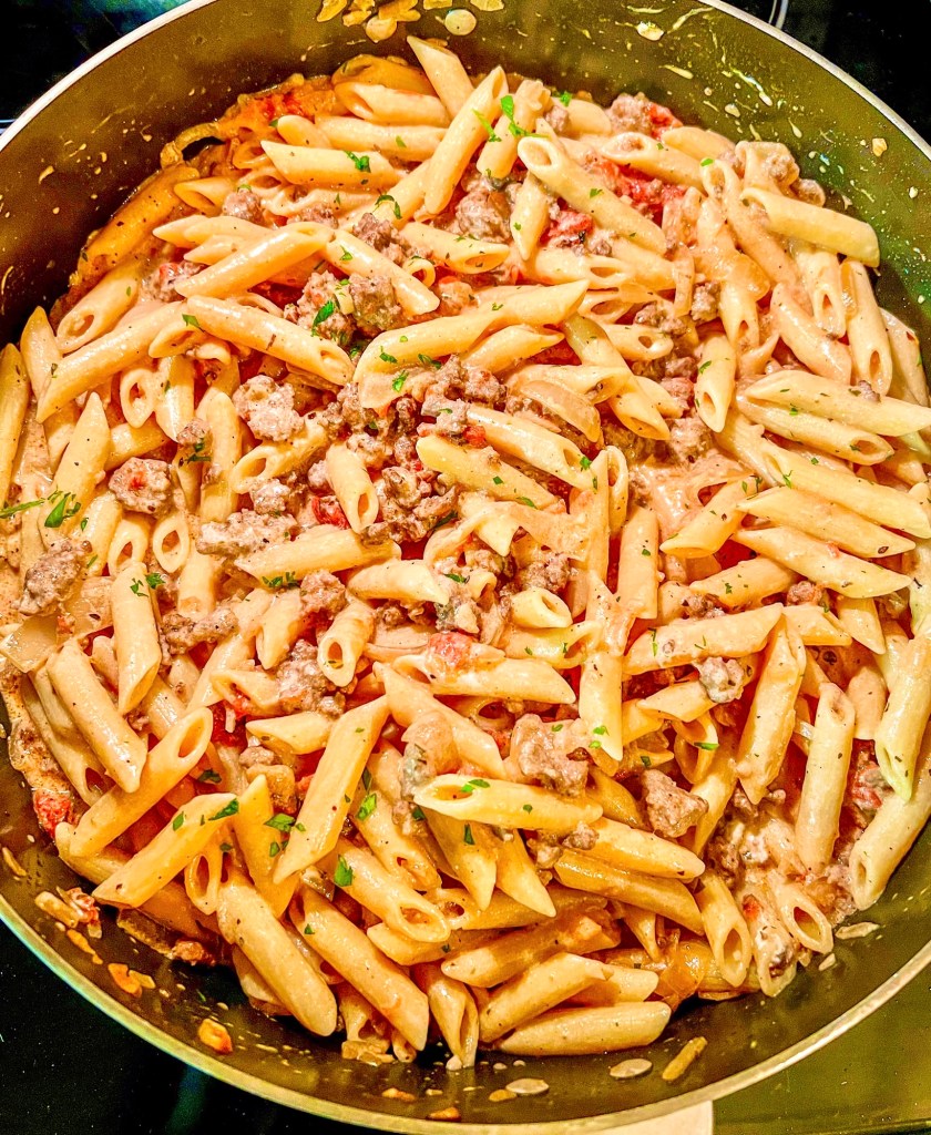 Beefy French Onion Pasta in a large skillet on the stove