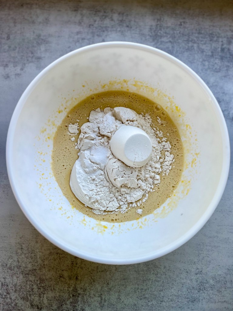 A large bowl filled with ingredients to make a brownie batter