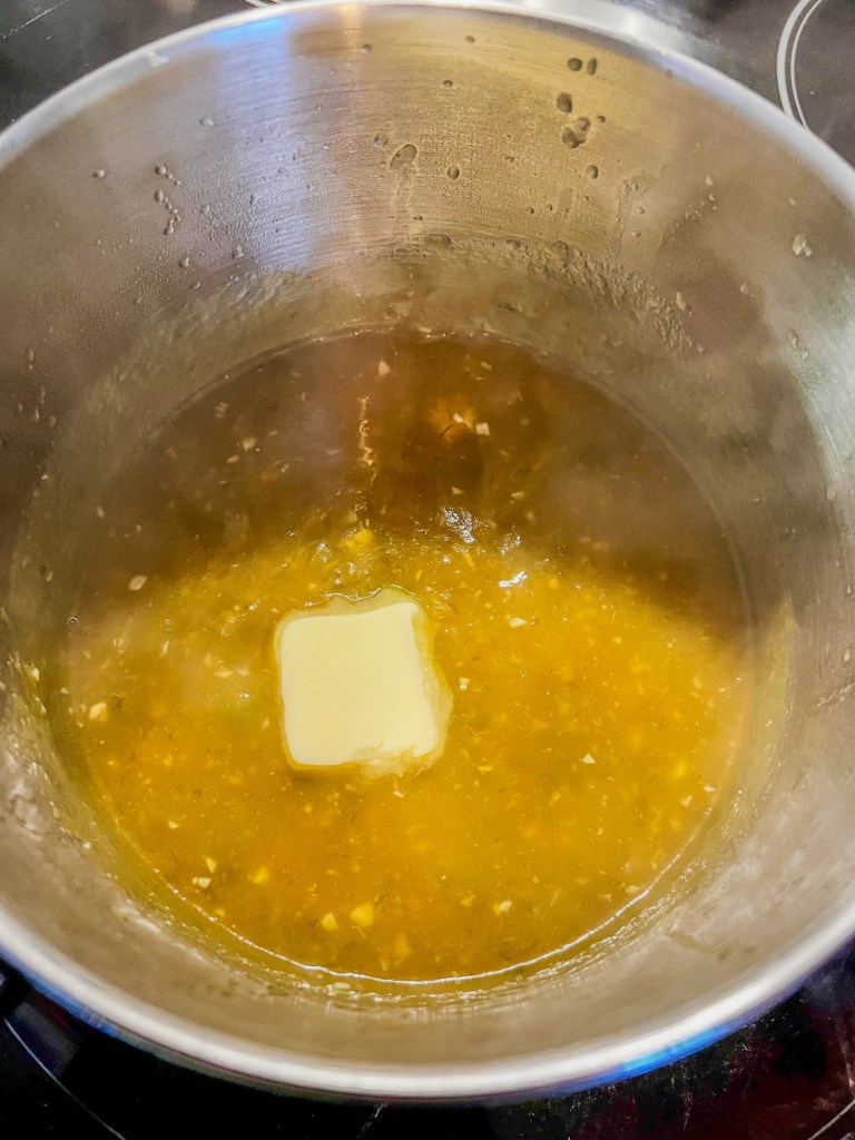 Mango serrano lime sauce in a saucepan on the stove