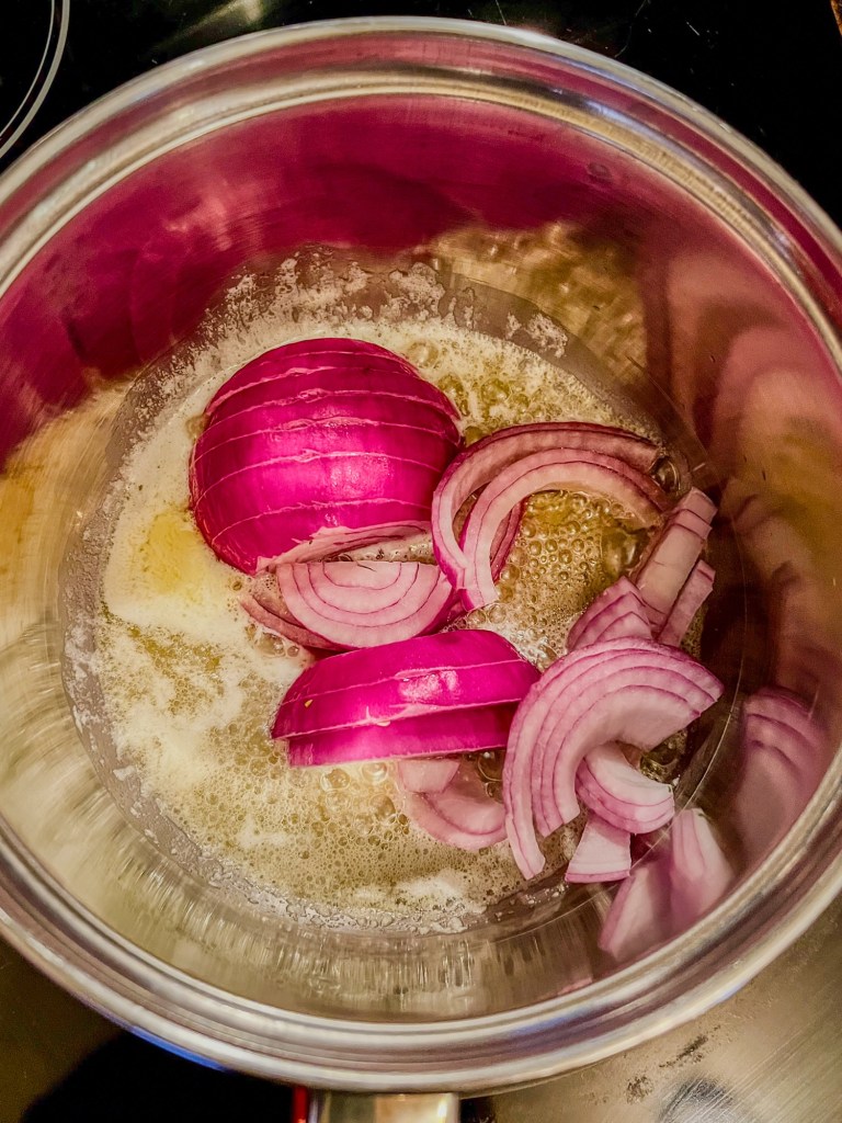 Butter and onion cooking in a saucepan