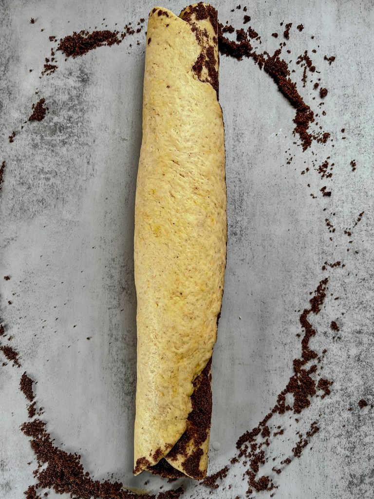 Cinnamon roll dough before being cut into rolls