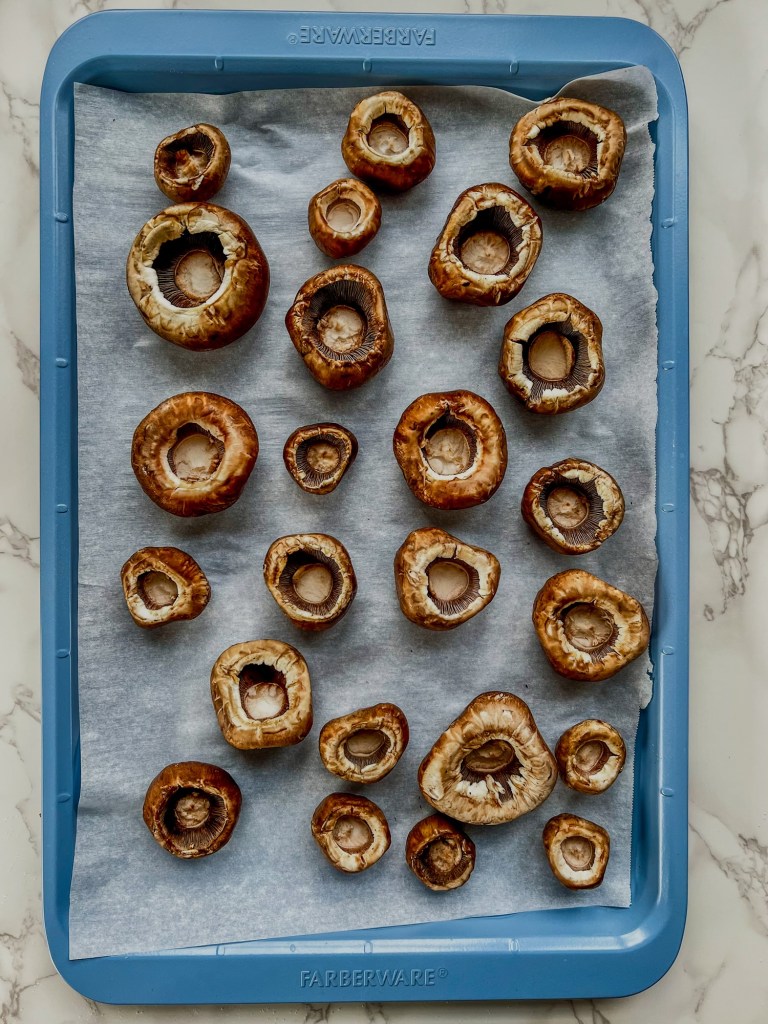 Baby Bella Mushrooms hollowed out and ready to be stuffed with a Korean filling