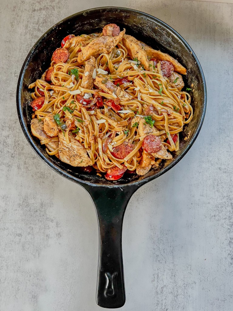 Sausage Chicken Cajun Pasta in an Xtrema pan on a countertop