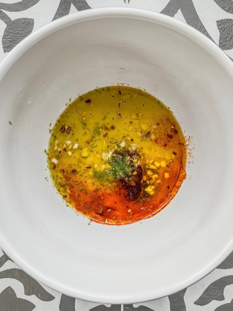 Chili lime oil ingredients in mixing bowl