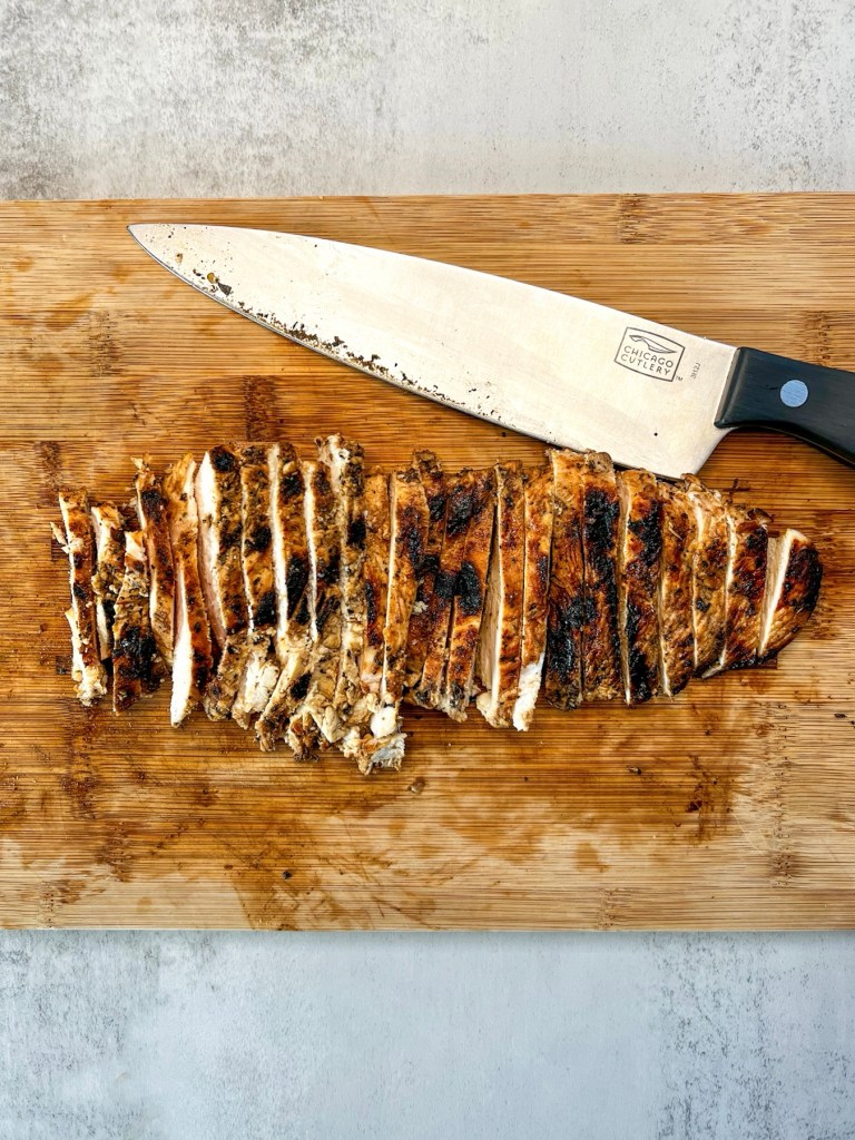 Thinly sliced grilled chicken breast that's been marinated in a balsamic chicken marinade