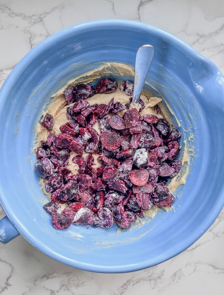 Cherry vanilla loaf cake batter in a bowl just before going into the loaf pan