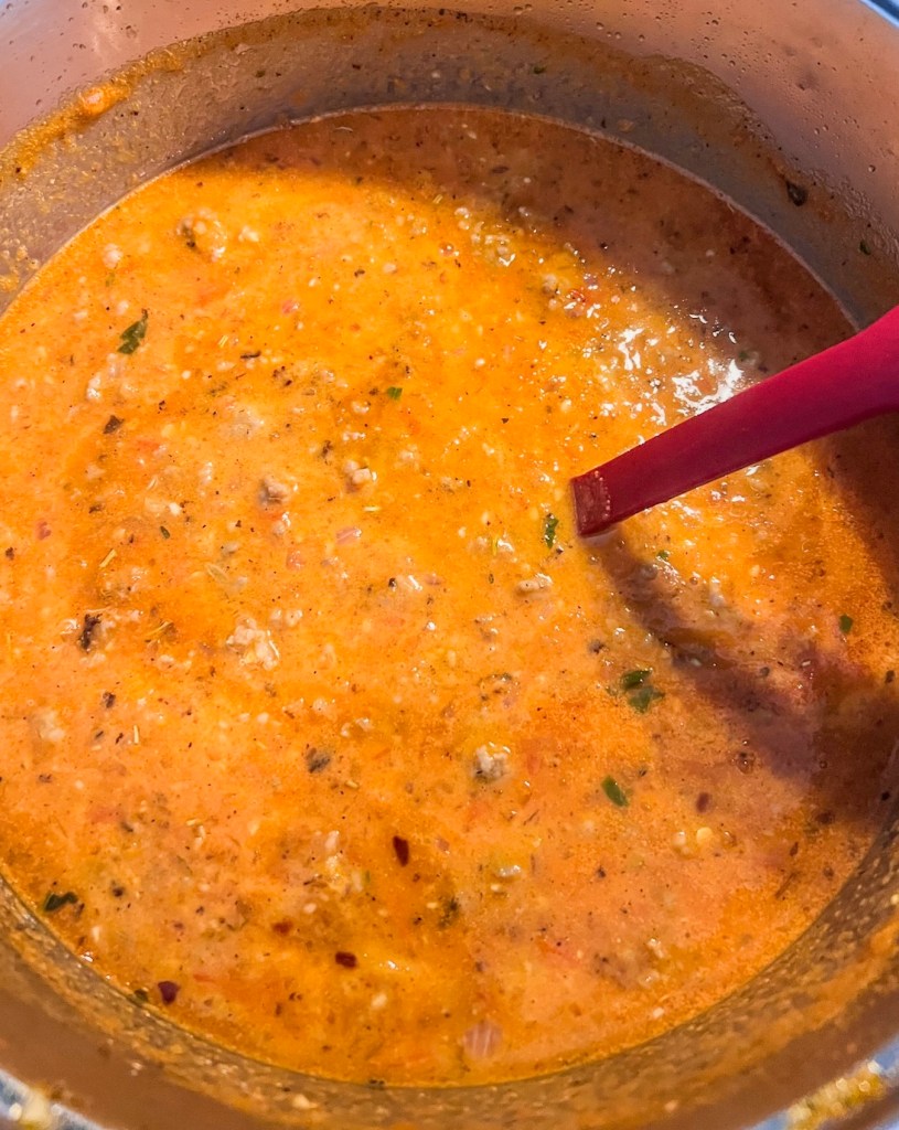 Tomato basil sausage soup with freshly added heavy cream