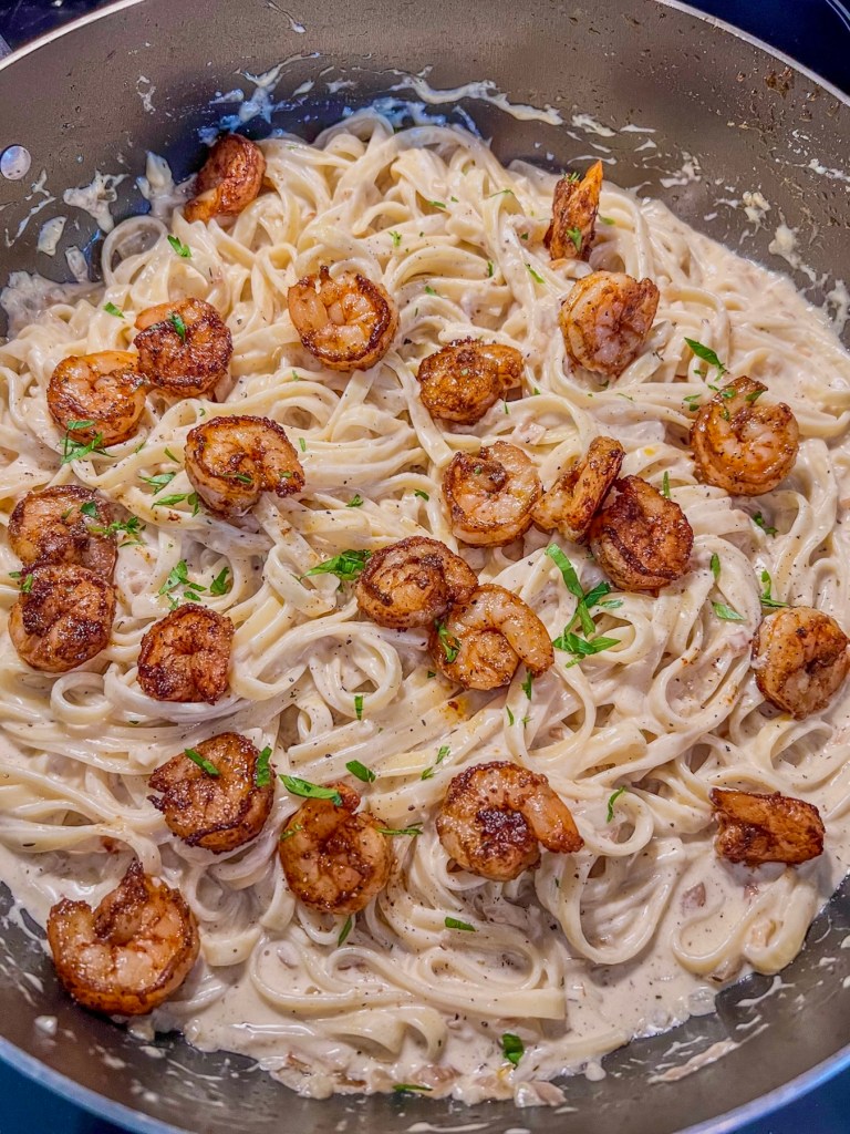 Freshly made pasta in a large skillet just before serving