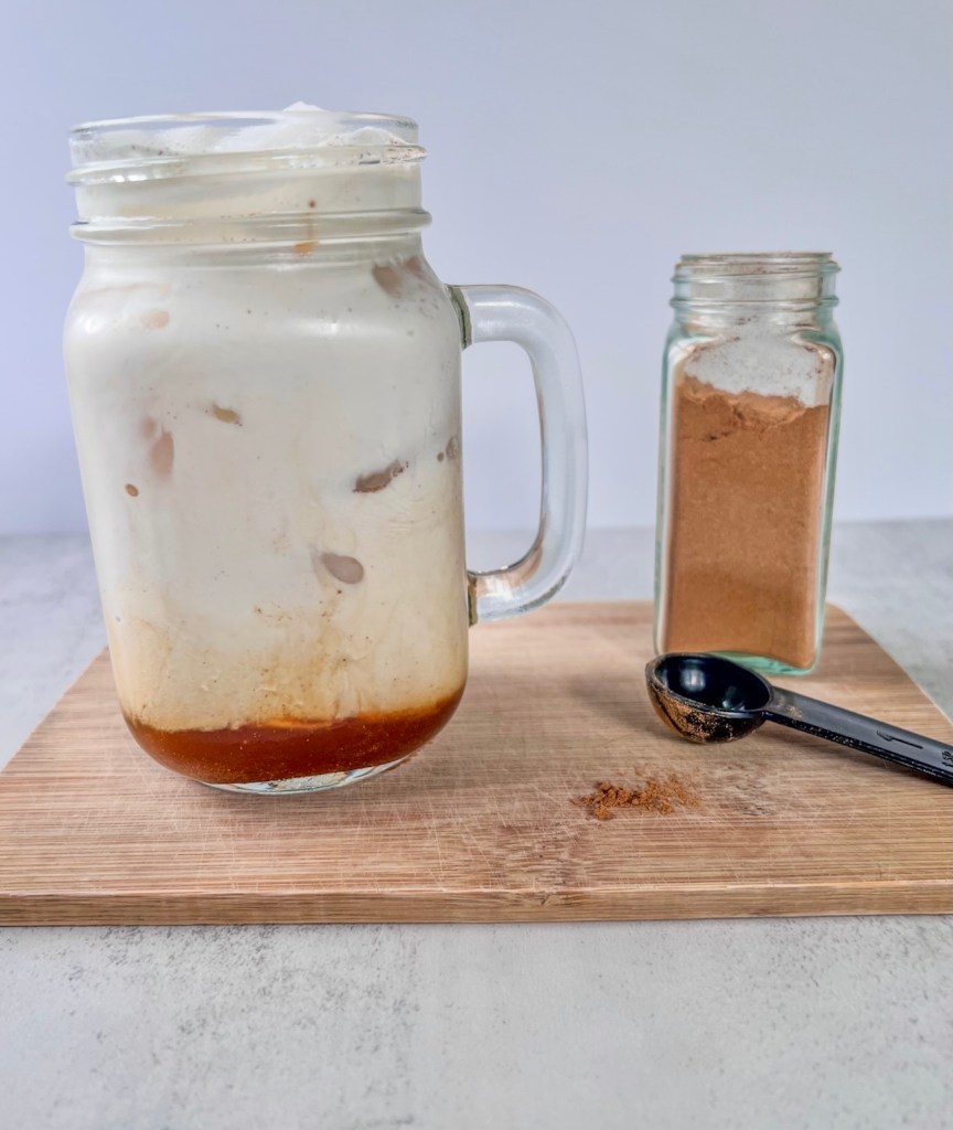 A fall forward iced coffee drink coming together.