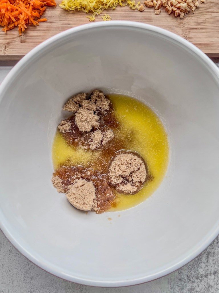 Melted butter and brown sugar in a large mixing bowl.